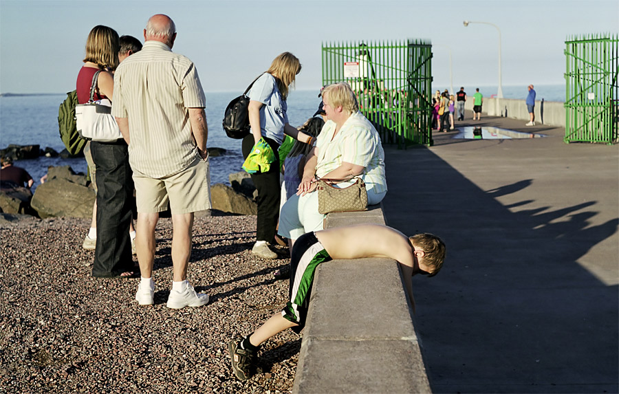A Boy Lays On A Ledge, Duluth, Minnesota, August 2010