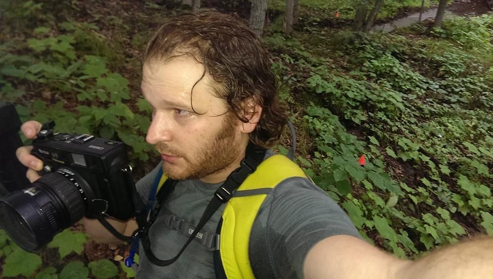 Holding a Fuji GW690III in the rain.