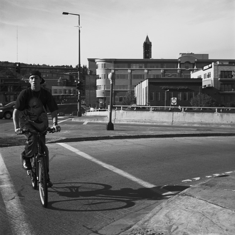Young Man Riding A Bike, 2009