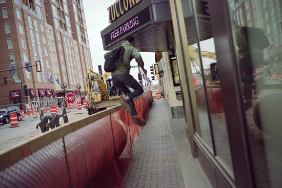 Man Leaping Over A Construction Barricade, Duluth, Minnesota, May 2011