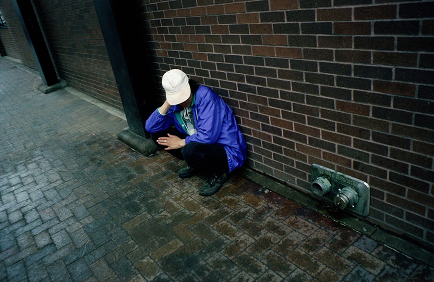 A Man in a Purple Coat