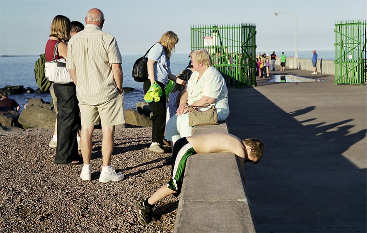 A Boy Lays On A Ledge, Duluth, Minnesota, August 2010