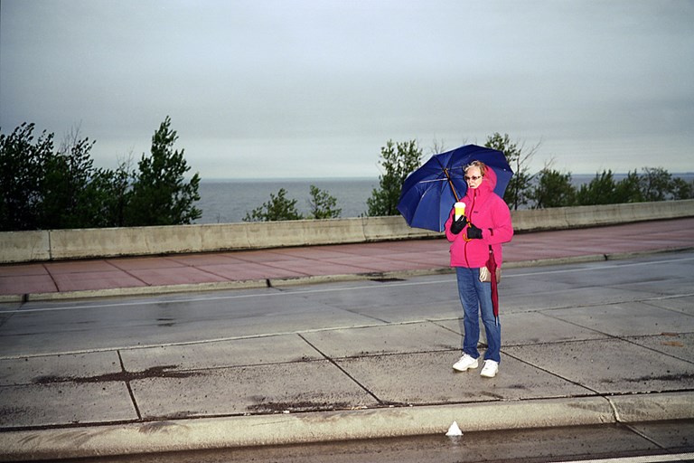 A Woman With An Umbrella
