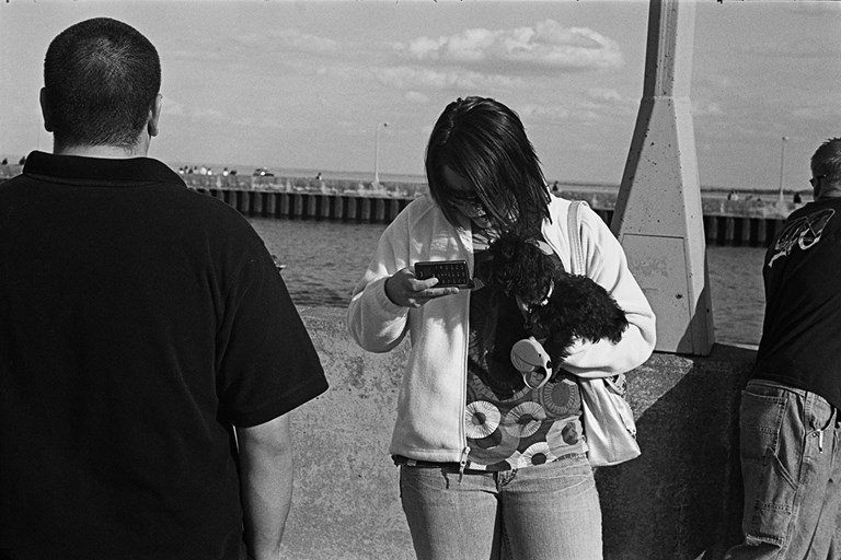 Texting Woman With a Dog , Duluth, Minnesota, May 2008