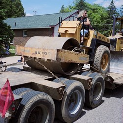 Woman On A Steamroller On A Trailer